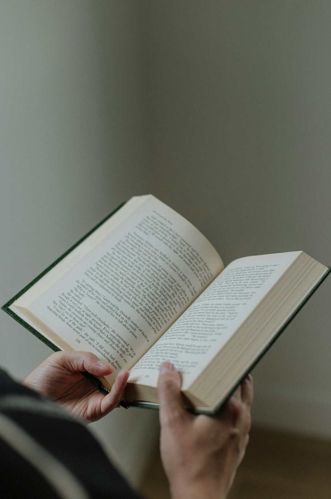 person reading old book