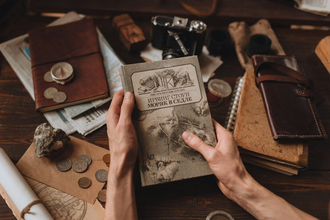 person examining old book