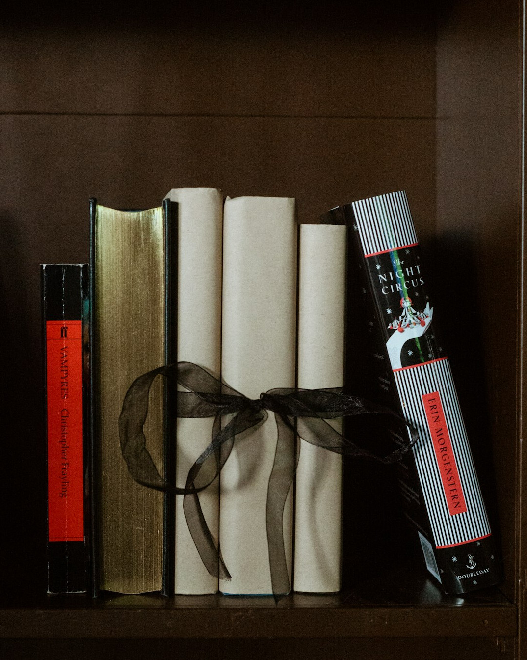 bookshelf with antique books
