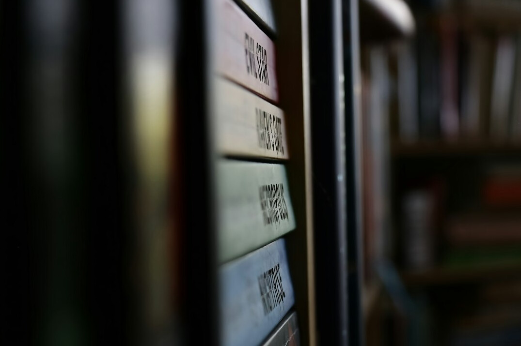 rare german books on wooden shelf